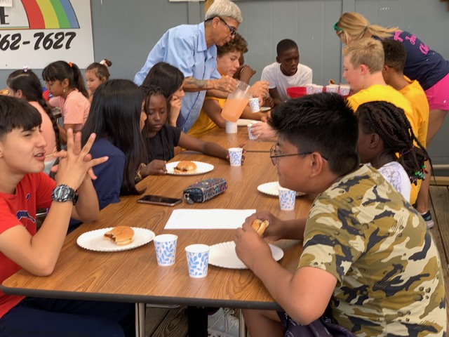 Community meal shared with youth after a workshop