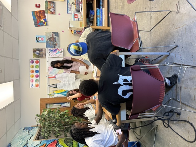 Small group discussion during an in-person workshop