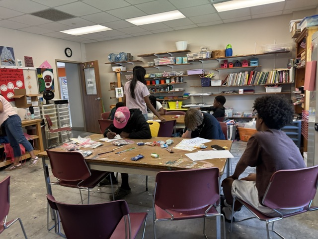 Students working on a hands-on craft activity